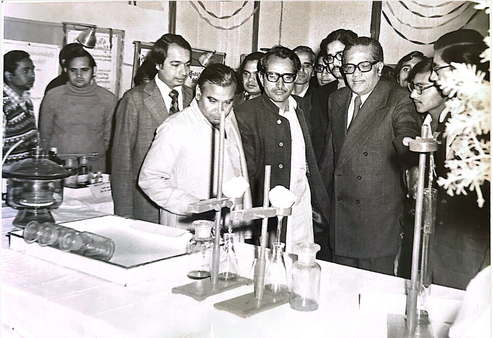 Dr. J.P. Sethi with colleagues at a research exhibition